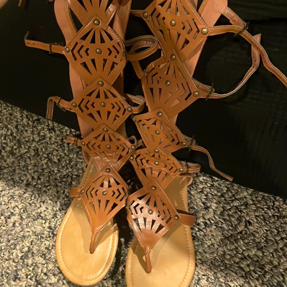 Dark brown gladiator adjustable sandals worn once